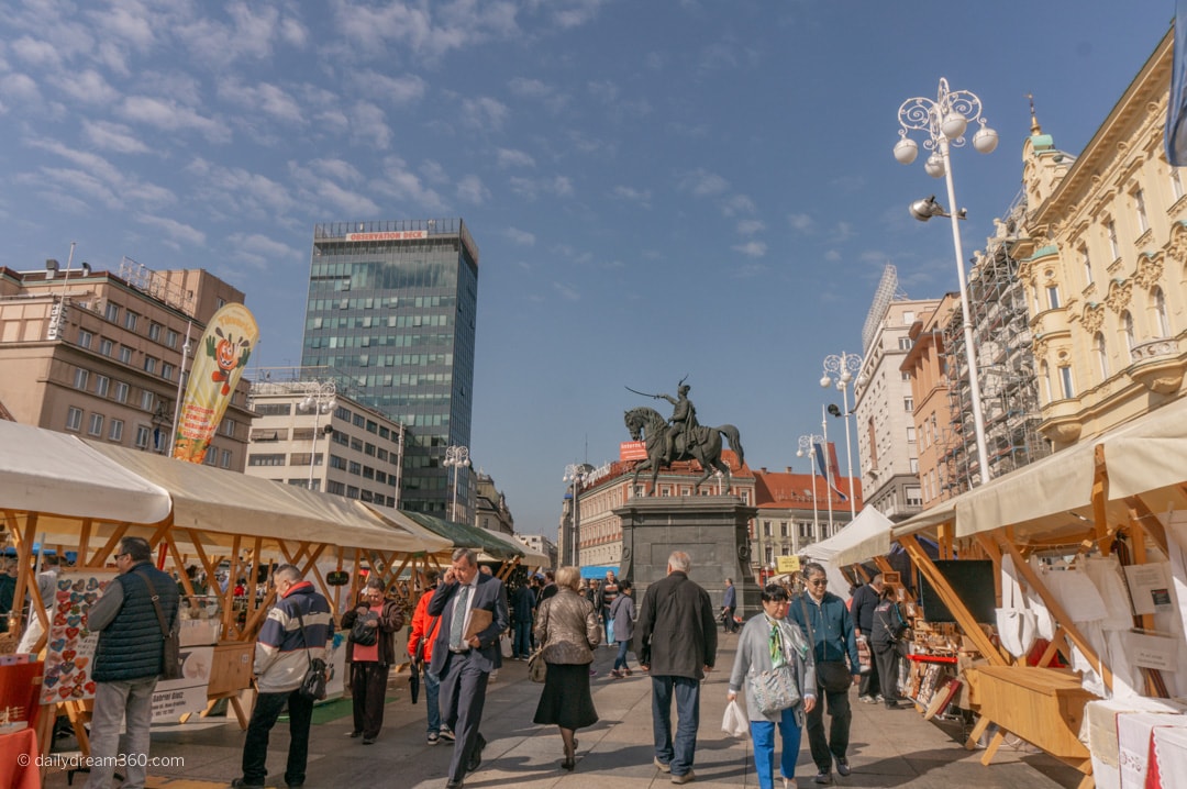 Ban Jelačić Square in Zagreb view of horse statue from inside farmer's market