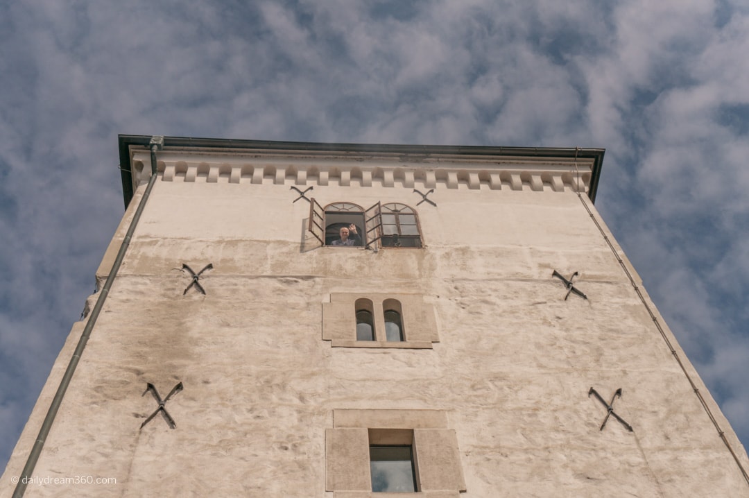 The Lotrščak Tower and Grič cannon man waves after firing cannon