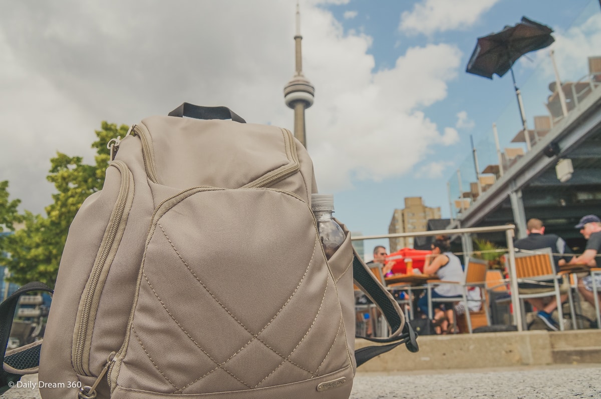 Travelon classic backpack with CN Tower behind